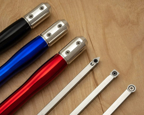 Front view: three carbide wood-turning tools with 12-inch aluminum lathe handles in blue, red, black, with inserts