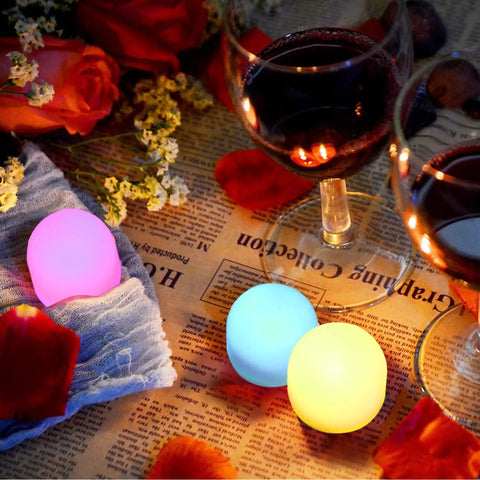 Color Changing Mini LED Night Light 7 Color Rainbow Mood Lighting Cordless Battery Powered Pack Of 12 in a romantic setting.