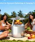 Heat Deflector For Bonfire And Fire Pit 19.5 Inch, 304 Stainless Steel With Carrying Handle And 3 Leg Stand outdoors with friends