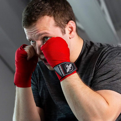 Premium Gym Grade Four Way Stretch Boxing Hand Wraps In Black With Top Shelf Wrist Support And Iron Knuckle Coverage For Hard Bag Work And Sparring Drills At 180 Inches Long