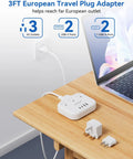 US To Europe Travel Plug Adapter With Three US Outlets And Four USB Ports, 7 In 1 travel power strip on a wooden table
