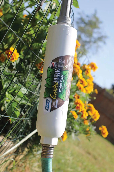 Top Shelf Inline Garden Hose Carbon Water Filter on a garden hose, designed for hydroponic and aeroponic systems.