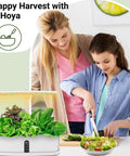 Two women using an All In One Hydroponic Seed Pod Kit With Eight Pods And Over Six Hundred Heirloom Non GMO Seeds For Cherry Tomato Roma Tomato Bell Pepper Jalapeno Cilantro And Onion.
