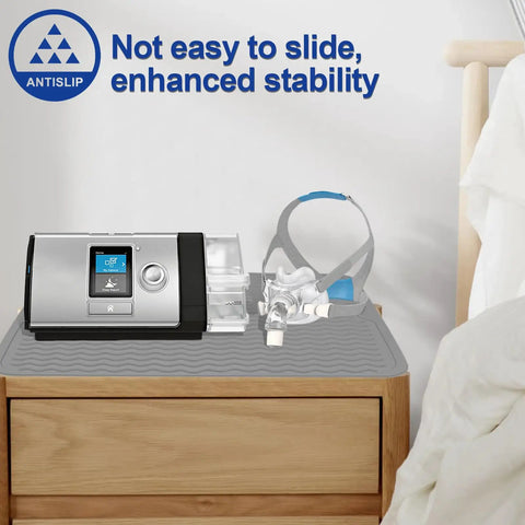 CPAP machine on CPAP Silicone Protector Mat For Nightstand Waterproof Non Slip Pad Guards Against Water Spills Heat Damage Vibration And Scratches From Your CPAP Machine Dark Gray