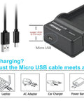 Close-up of slim USB charger for Two Pack High Capacity Canon LP-E10 Batteries With Slim USB Charger For EOS 1100D 1200D T3 T5 Kiss X50 X70 DSLRs And LPE10 Grip, showing micro USB input.