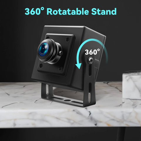 5MP USB Camera With 180 Degree Fisheye Lens on 360° rotatable stand, marble surface, industrial design, USB port visible
