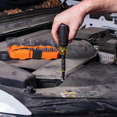 Using Impact Rated 46 Piece Multi Bit Screwdriver And Nut Driver Set With MODbox Case on vehicle engine bolt