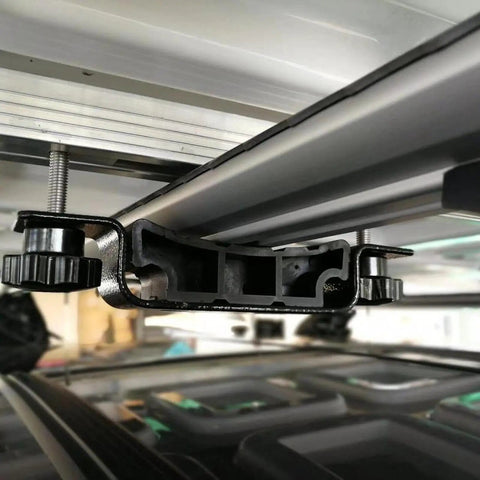 Close-up of the Rooftop Tent Mount Bracket Kit with Quick Release Clamp for roof racks and crossbars for SUVs.