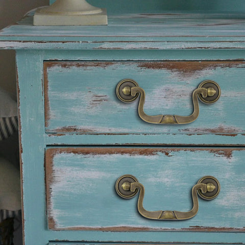 Antique Bronze Cabinet Pulls Set Of 4 With 3.5 Inch Center Hole 88mm Vintage Dresser Handles installed on weathered blue dresser
