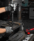 Person using 24-Piece Slide Hammer Kit for auto repair and dismantling, dowel pin puller with adapters, on a workbench.