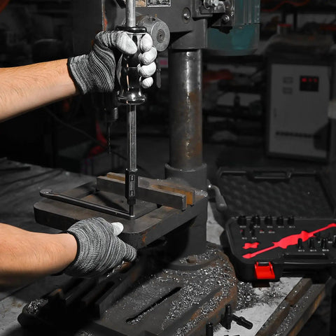 Person using 24-Piece Slide Hammer Kit for auto repair and dismantling, dowel pin puller with adapters, on a workbench.