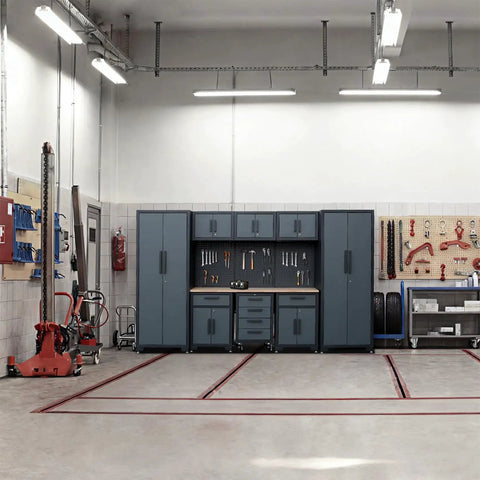 Installed 9 Piece Garage Storage Cabinet System With Locking Steel Cabinets, Locker Units, Wall Cabinets, and Workbench in black with grey handles.