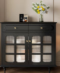 Black cabinet with 20 Pack Flower Drawer Knobs Set Brushed Brass For Dresser Closet And Cabinets, 1.42 Inch Diameter, 1.02 Inch Height.