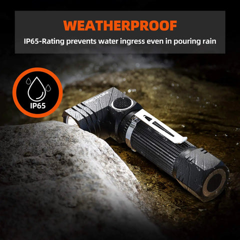 Beast 600 Lumen Tactical Flashlight With 90 Degree Angled Head IP65 waterproof LED mini light resting on wet rock.
