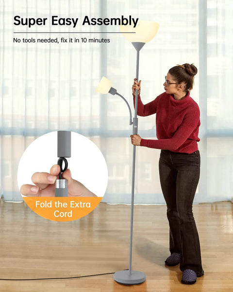 Modern Silver Floor Lamp With Dual LED Heads, 12W Main Light And 4W Adjustable Reading Lamp, 2700K Warm White shown during assembly