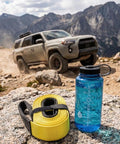 3 Inch Wide 8 Foot Tree Saver Strap With Loops Heavy Duty Winch And Recovery Tow Strap 30000 Lbs MBS on rock with SUV