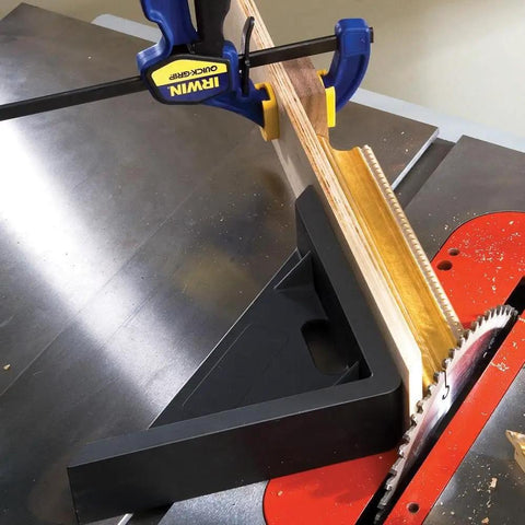 Side view of a 45 Degree Miter Sled For Table Saw With Beefy Durability And Low Friction Sliding Fits Standard Three Eighths By Three Quarters Inch Miter Slot Fence Accessory For Precise 90 Degree Cuts installed on a table saw showing a wooden board being cut at an angle.