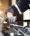 Mechanic using Beast Mode Impact Socket Set With Three Eighths Inch Drive Fifty Piece SAE And Metric 6 Point Sockets CR V Steel