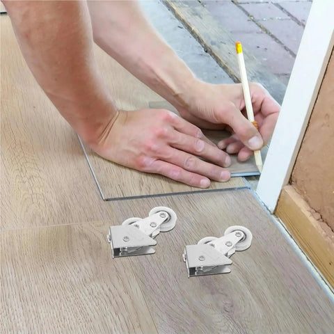 Top Shelf Heavy Duty Aluminum Screen Door Rollers Four Pack Double Wheel Sliding Track Pulleys on wood flooring for installation.