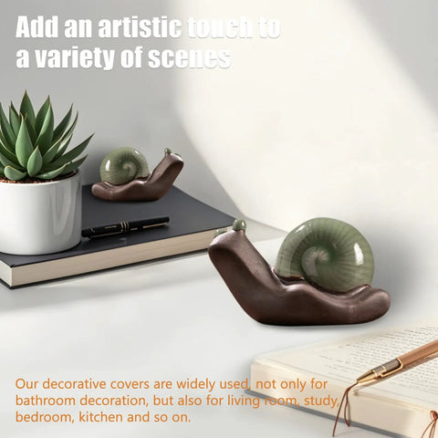 Two Piece Ceramic Snail Toilet Bolt Covers Kicking Up Your Bathroom Vibe With A Super Smooth Push On Install Universal Fit For Worn Floor Bolts And Rusty Plumbing Trim on a desk with plants and notebook.