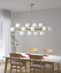 Modern chandelier with multiple white globe lights over dining table