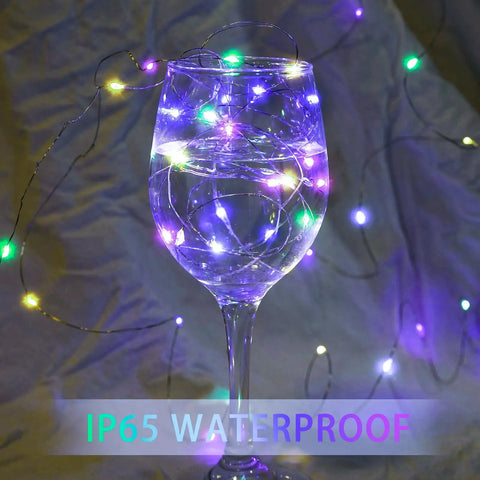 IP65 waterproof 8 Pack 7Ft Fairy Lights with 20 LED Twinkle String Lights Battery Operated in wine glass display.