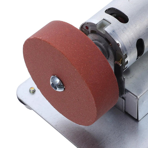 Close-up of the sharpening wheel on the Rock Solid Electric Knife Sharpener Stainless Steel Bench Grinder for kitchen tools.