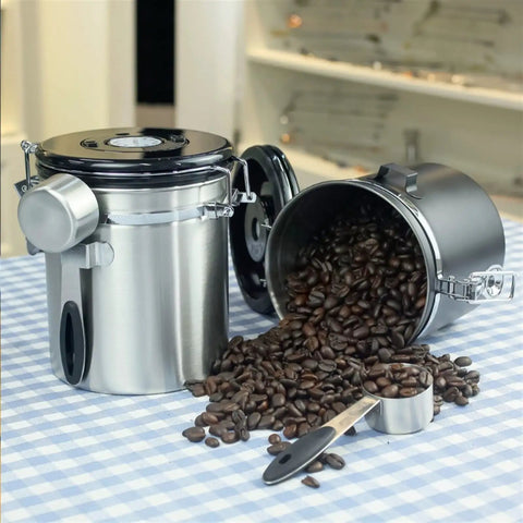 Stainless Steel Airtight Coffee Container Set With Scoop keeps fresh coffee beans on kitchen table, showcasing storage efficiency.