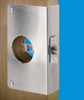 Stainless Steel Door Lock Reinforcement Plate for 1-3/4 Inch Thick Doors mounted on wood with latch detail.