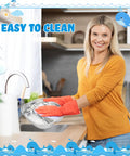 Woman cleaning Heavy Hitter 15 Piece Stainless Steel Kids Dinnerware Set with three compartment plates at a sink.