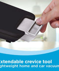 Hand demonstrating extendable crevice tool of Powerful Cordless Handheld Vacuum For Cars And Home With Pivoting Nozzle, 20V Max.
