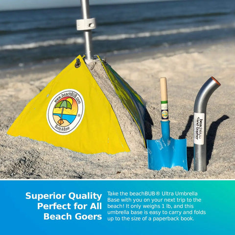 Ultra Beach Umbrella Base for 7.5 Ft Umbrellas with tools on sandy beach, showing stability and setup.