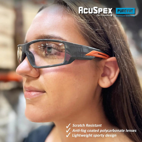 Kick Ass Full Frame Clear Safety Glasses With Smooth Sporty Fit And Badass 99 Point 9 Percent Uv Shielding For Serious Eye Coverage And All Day Grind Comfort In A 144 Pair Bulk Pack on a woman.