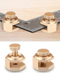 Rock Solid Four Pack Aluminum Stair Gauge Set For Framing Squares Gold Pro Gear Quick Slide Clamps close-up on clamps with framing square.