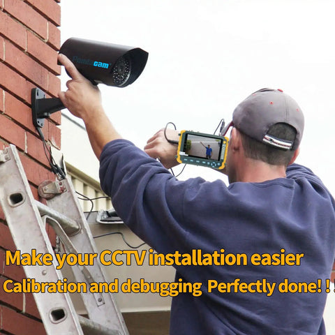 Technician using portable 5 inch CCTV monitor and camera tester on the go 4 in 1 8MP AHD TVI CVI CVBS 1080P for setup