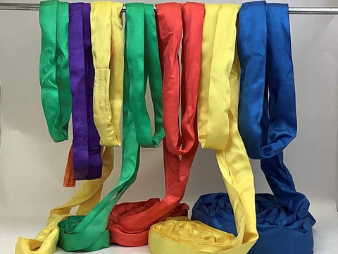 Various colored lifting slings, including blue 10 ft endless round sling 21200 lb vertical WLL and 42400 lb basket capacity.