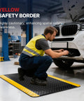 Anti Fatigue Standing Mat For Workshops And Labs With Fifteen Sixteenth Inch High Density Memory Foam And Bright Yellow Border 12 By 3 Feet Heavy Duty Ergonomic Floor Mat To Reduce Foot Knee And Lower Back Fatigue During Long Shifts in garage setting