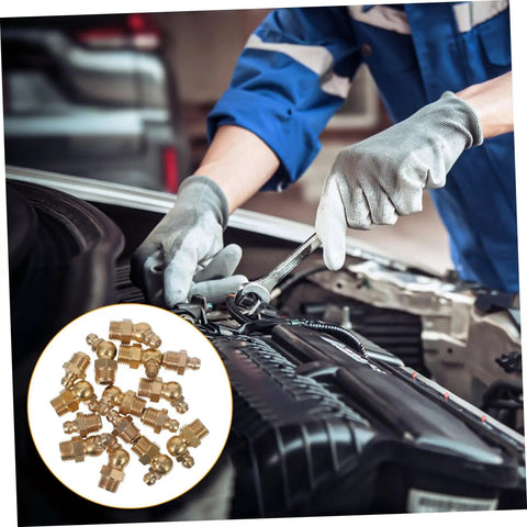 Grease Fittings Kit With Straight And Angled Nozzles For Automotive And Industrial Use Includes Storage Box For Easy Organization Assorted Nipples And Fittings For Repairs And Maintenance seen in use during vehicle maintenance with hand and glove.