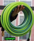 Hybrid Rubber Air Hose Three Eighths Inch By One Hundred Feet Three Hundred PSI with green and blue color, hand holding coil