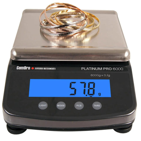 Platinum PRO6000 Digital Jewelry Scale with bangles, 6000G capacity, 0.1G readability, clear LCD display, for countertop and portable use.