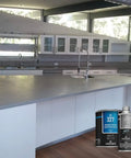 Rock Hard Concrete Countertop Sealer Semi Gloss Water Based Formula applied on modern kitchen concrete island.