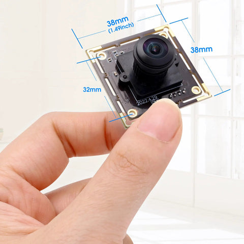 Close-up of 16MP Wide Angle USB Camera Module With 180 Degree Fisheye Lens For Linux Windows Android Mac held in hand.