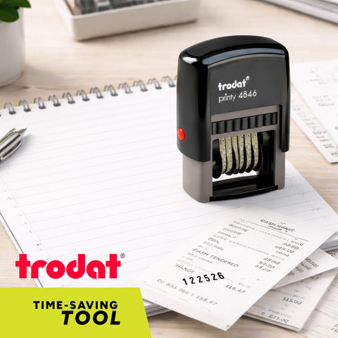 Six Digit Self Inking Numbering Stamp With Crisp Black Ink Marks And Zero Mess Build For Fast Office Workflows That Really Nails The Job Every Single Time on a ledger with receipts.