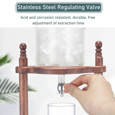 Craft Your Perfect Chilled Cup With This Sleek Glass Cold Brew Drip Tower Featuring Precision Flow Valves And A Solid Wood Base, showing stainless steel valve.