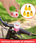 Person pouring mineral oil into Pro Grade Hydraulic Disc Brake Bleed Kit with adapters for Shimano TEKTRO TRP bikes on handlebar