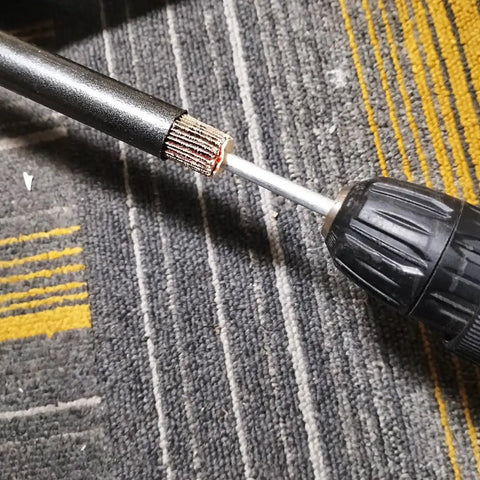 Close-up of Extra Long 90mm Flap Wheel Sanding Set With 1 Quarter Inch Shank For Drill Grinder And Rotary Tools in use on a carpeted surface