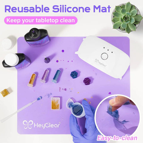 UV Resin Kit With Light 200g Crystal Clear Epoxy For Beginners Starter Kit with tools and accessories on silicone mat