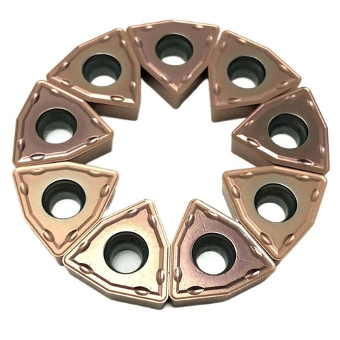 Heavy Duty Indexable Carbide Lathe Tool WCMT050308 cutting inserts arranged in a circle, designed for CNC turning steel or stainless.