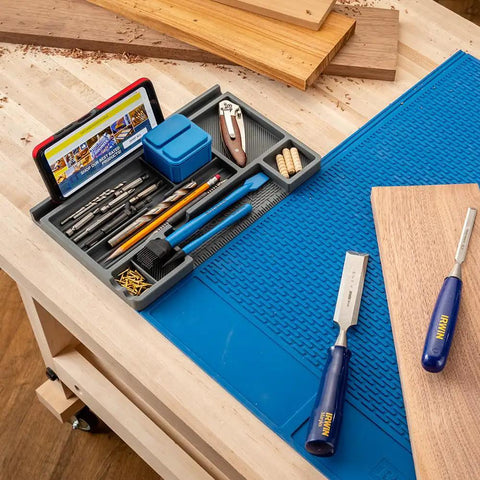 Silicone Project Tray Flexible Catch All Organizer For Small Parts Portable Tool Tray With Compartments And Glue Shedding Surface Easy Clean For Sorting Screws Hardware Fasteners on a workbench with tools