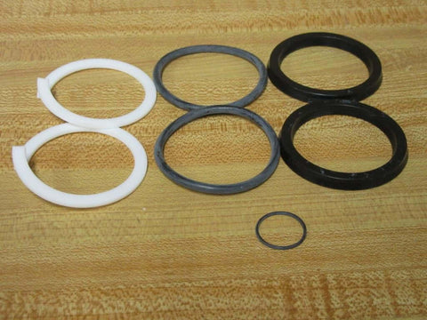Hydraulic pump seal kit P-106874-K0002 P106874K0002 7-piece replacement o-ring gasket set with black and white rings on table